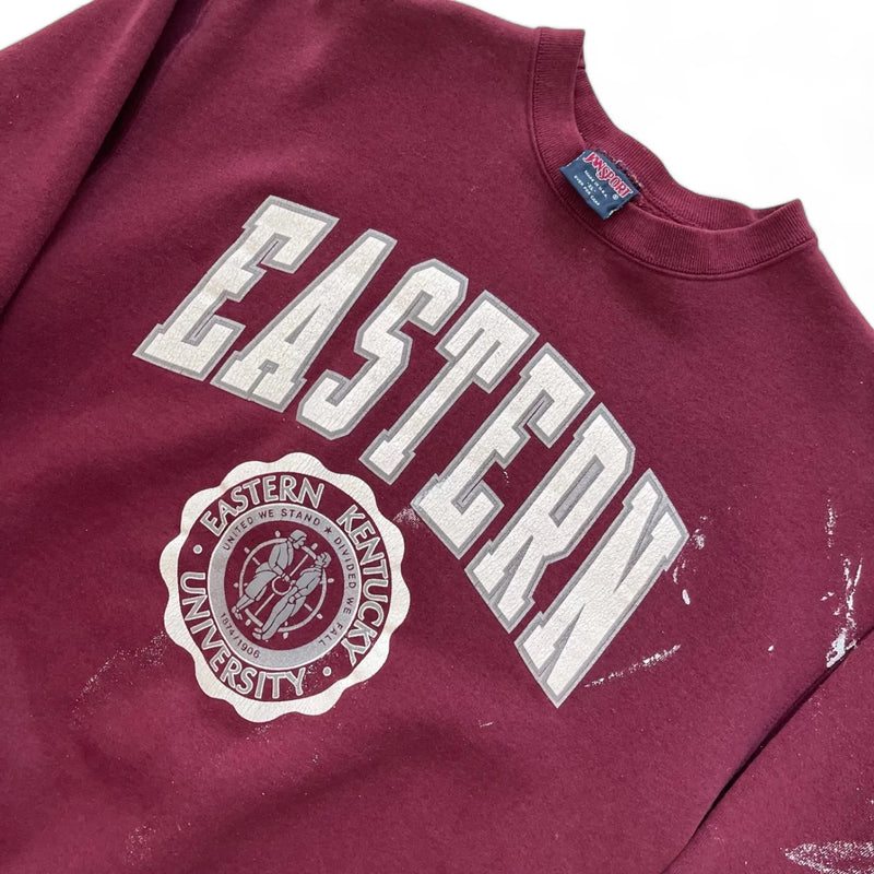 Vintage Y2K Jansport Eastern Kentucky University Print With White Text And Emblem, Distressed Look With Paint Splatter Effect Sweatshirt Maroon Size Large