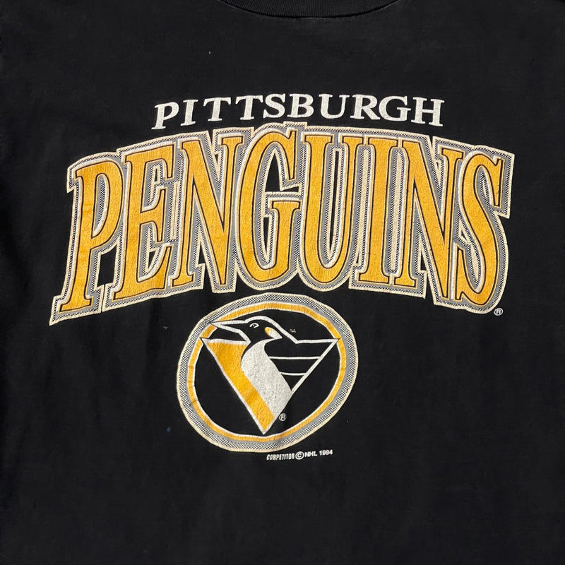 Vintage Black T-shirt With 'Pittsburgh Penguins' Logo And Penguin Emblem In Yellow And White, 1994 Copyright. T-Shirt Black Size